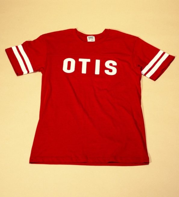 Father's Day Gift. Red sports style shirt with white lettering and stripes reads: "Otis".